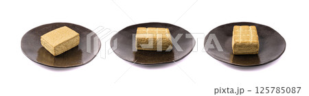 Tofu Cheese Isolated, Smoked Vegan Cheese Slice, Sliced Soya Bean Curd, Soy Protein or TSP 125785087