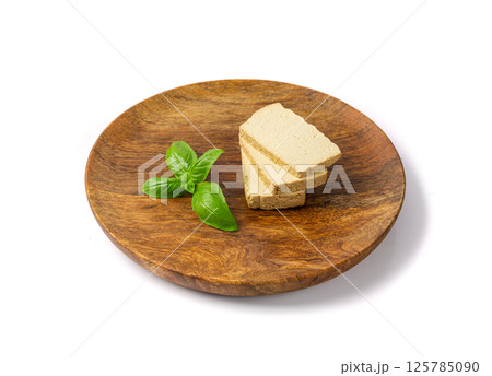 Tofu Cheese Isolated, Smoked Vegan Cheese Slice, Sliced Soya Bean Curd, Soy Protein or TSP 125785090