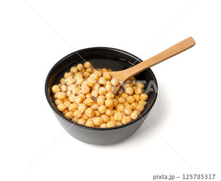 Soaked chickpeas, chick pea in water, swollen wet Cicer arietinum fruits, garbanzo beans cooking Soaked chickpeas, chick pea in water, swollen wet Cicer arietinum fruits, garbanzo beans cooking 125785317