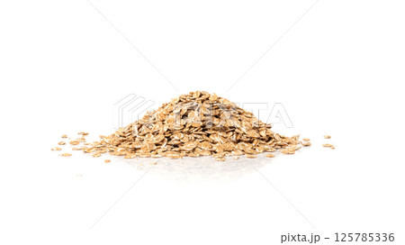 Spelt flakes isolated, dry raw rolled flat oat grains, wheat, oatmeal or bran, barley rye cereals 125785336