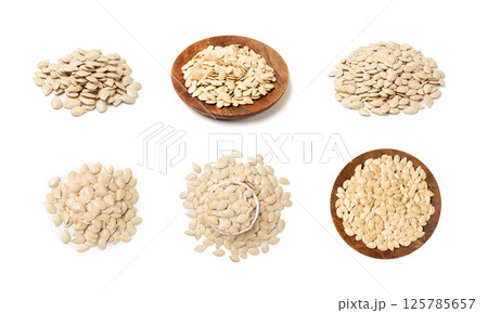 Whole Pumpkin Seeds in Shell Isolated, Raw Pepita Grains, Scattered Green Healthy Nuts Whole Pumpkin Seeds in Shell Isolated, Raw Pepita Grains, Scattered Green Healthy Nuts 125785657