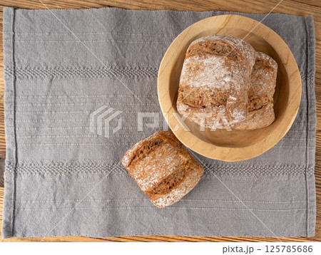 Brown rye bun, square gluten free bread, whole grain healthy breakfast bread 125785686