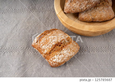 Brown rye bun, square gluten free bread, whole grain healthy breakfast bread 125785687