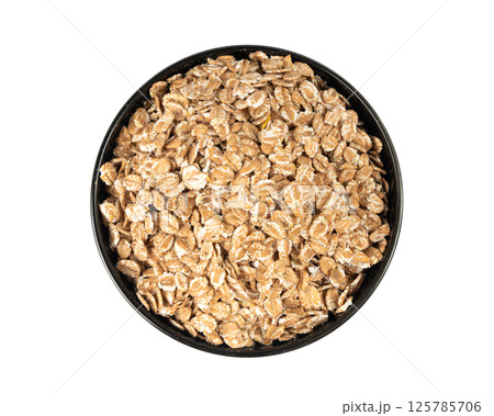 Spelt flakes isolated, dry raw rolled flat oat grains, wheat, oatmeal or bran, barley rye cereals 125785706