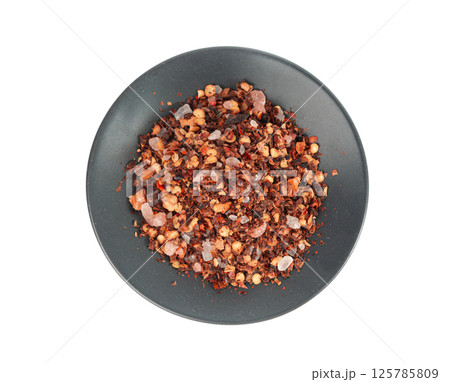 Chili and salt seasoning, red chilli pepper spice powder, dry crushed hot pepper flakes Chili and salt seasoning, red chilli pepper spice powder, dry crushed hot pepper flakes 125785809
