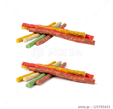 Rawhide chew sticks for dogs, colorful collagen dog food, pressed dry kibble, dental care treats Rawhide chew sticks for dogs, colorful collagen dog food, pressed dry kibble, dental care treats 125785833