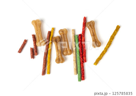 Rawhide chew sticks for dogs, colorful collagen dog food, pressed dry kibble, dental care treats Rawhide chew sticks for dogs, colorful collagen dog food, pressed dry kibble, dental care treats 125785835