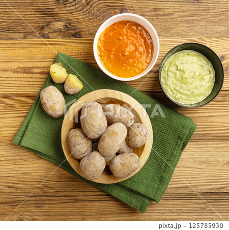 Red mojo rojo and green mojo verde sauces, traditional Tenerife dips, mojo picon dressing 125785930