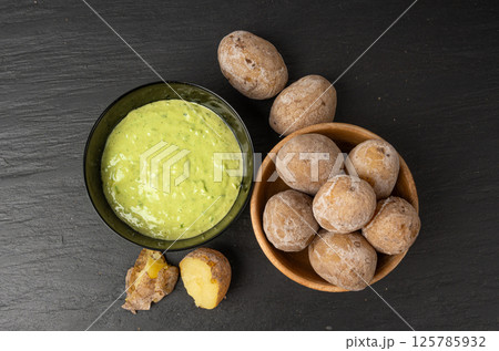 Red mojo rojo and green mojo verde sauces, traditional Tenerife dips, mojo picon dressing Red mojo rojo and green mojo verde sauces, traditional Tenerife dips, mojo picon dressing 125785932