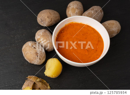 Red mojo rojo and green mojo verde sauces, traditional Tenerife dips, mojo picon dressing 125785934