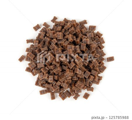 Mini bone-shaped pet food, small dogs crunchy treats, flavored brown dry kibble, canine food Mini bone-shaped pet food, small dogs crunchy treats, flavored brown dry kibble, canine food 125785988