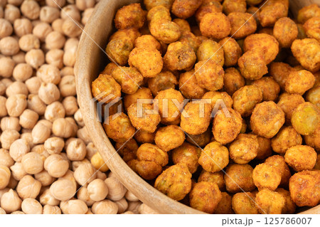 Roasted chickpeas, leblebi pile, spicy fried chana, crispy chick peas with mint and spices, east snack 125786007