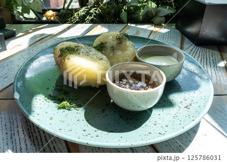 Lithuanian potato dumplings, cepelinai pancakes or kolduny, meat stuffed draniki, traditional didzkukuliai 125786031