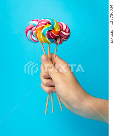 Color lollipop, spiral candy on stick, colorful striped lollypop, round fruit caramel, circle lollipop Color lollipop, spiral candy on stick, colorful striped lollypop, round fruit caramel, circle lollipop 125786034