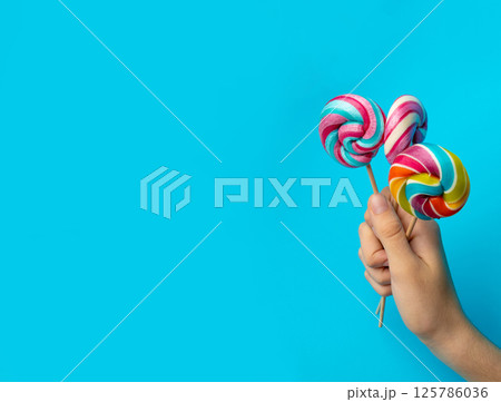 Color lollipop, spiral candy on stick, colorful striped lollypop, round fruit caramel, circle lollipop Color lollipop, spiral candy on stick, colorful striped lollypop, round fruit caramel, circle lollipop 125786036