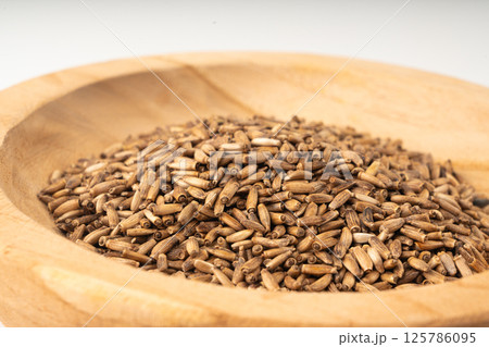 Milk thistle seeds, silybum marianum grains, dry blessed milkthistle fruits, variegated thistle kernels 125786095