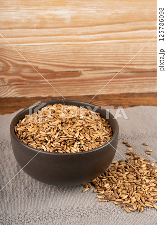 Milk thistle seeds, silybum marianum grains, dry blessed milkthistle fruits, variegated thistle kernels 125786098