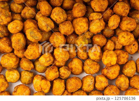 Roasted chickpeas, leblebi pile, spicy fried chana, crispy chick peas with mint and spices, east snack Roasted chickpeas, leblebi pile, spicy fried chana, crispy chick peas with mint and spices, east snack 125786136