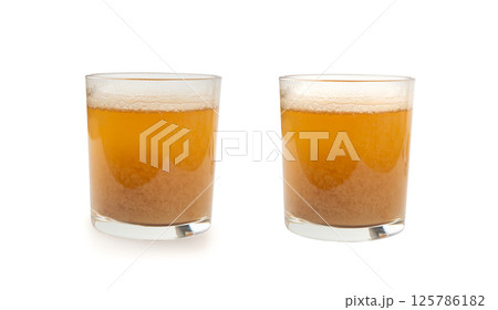 Maca powder drink isolated, dry Peruvian ginseng beverage, powder in water, ground ayak willku tea Maca powder drink isolated, dry Peruvian ginseng beverage, powder in water, ground ayak willku tea 125786182