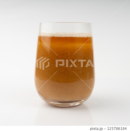 Maca powder drink isolated, dry Peruvian ginseng beverage, powder in water, ground ayak willku tea 125786184