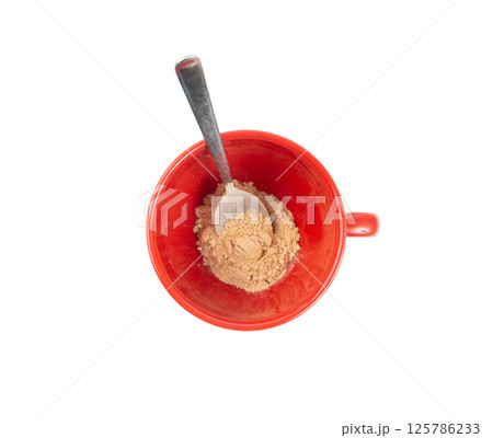 Maca powder drink isolated, dry Peruvian ginseng beverage, powder in water, ground ayak willku tea Maca powder drink isolated, dry Peruvian ginseng beverage, powder in water, ground ayak willku tea 125786233