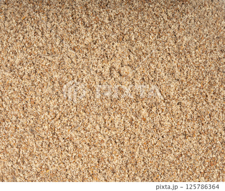 Milk thistle seeds powder, crushed silybum marianum grains pile, milled dry blessed milkthistle Milk thistle seeds powder, crushed silybum marianum grains pile, milled dry blessed milkthistle 125786364