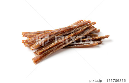 Fish Jerky Isolated, Dry Salted Seafood Snack, Hake Stockfish, Small Pieces of Dehydrated Pollock 125786856