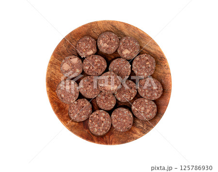 Black pudding isolated, blood sausage kaszanka, traditional Polish terrine, brawn sausages on white Black pudding isolated, blood sausage kaszanka, traditional Polish terrine, brawn sausages on white 125786930