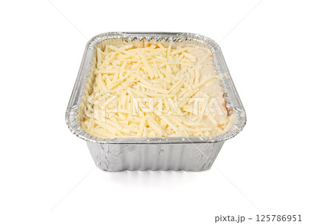 Lasagna portion in aluminium foil tray isolated. Oven baked lasagne for heating, container, airplane food 125786951