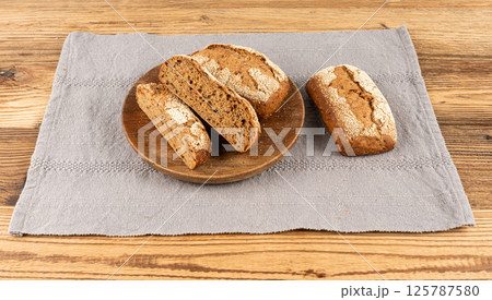 Whole wheat brown bread, fitness pumpkin carrot buns with seeds, cereal bread grain bun 125787580