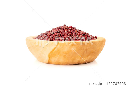 Red adzuki beans isolated, raw azuki bean pile, Vigna angularis legume seeds, dry red mung bean Red adzuki beans isolated, raw azuki bean pile, Vigna angularis legume seeds, dry red mung bean 125787668