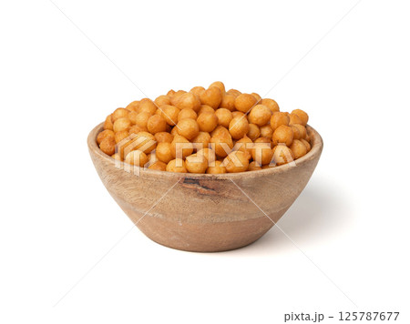 Small pastry balls, fried crispy wheat soup pearls, salad egg puffs or choux pastry Small pastry balls, fried crispy wheat soup pearls, salad egg puffs or choux pastry 125787677