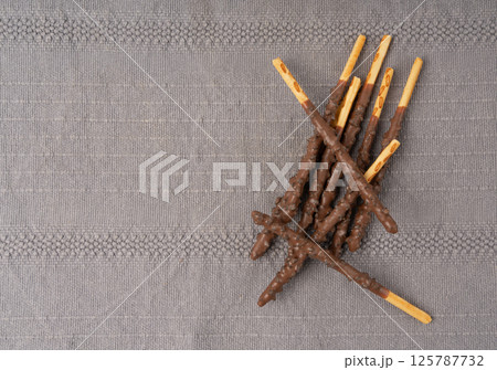 Chocolate cookie sticks, long choco pastries, japan biscuit tubes, korea cracker sticks Chocolate cookie sticks, long choco pastries, japan biscuit tubes, korea cracker sticks 125787732