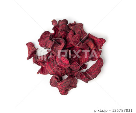 Dry beetroot chips isolated, dried sliced red beet flakes pile, beet root pieces and chips Dry beetroot chips isolated, dried sliced red beet flakes pile, beet root pieces and chips 125787831