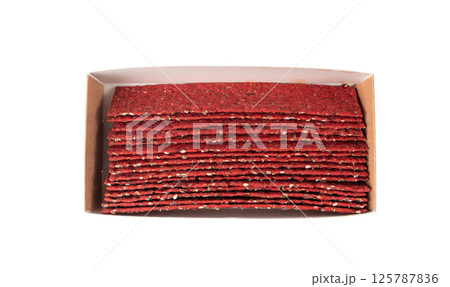 Beetroot crackers, thin rusk beet root bread, red diet multigrain crispbread, various seeds 125787836