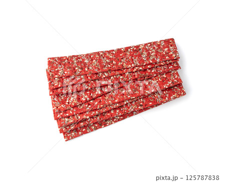 Beetroot crackers, thin rusk beet root bread, red diet multigrain crispbread, various seeds 125787838