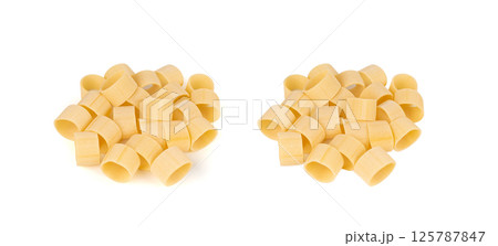 Raw Calamarata Big Pasta Isolated, Homemade Dry Macaroni, Italian Raw Round Noodle Raw Calamarata Big Pasta Isolated, Homemade Dry Macaroni, Italian Raw Round Noodle 125787847