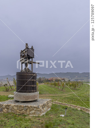 Old wine press near Castello di Razzano and Alfiano Natta, Barolo wine region, province of Cuneo, region of Piedmont, Italy Old wine press near Castello di Razzano and Alfiano Natta, Barolo wine region, province of Cuneo, region of Piedmont, Italy 125789097