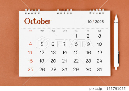 October 2026 Monthly desk calendar for 2026 year and pen. October 2026 Monthly desk calendar for 2026 year and pen. 125791035