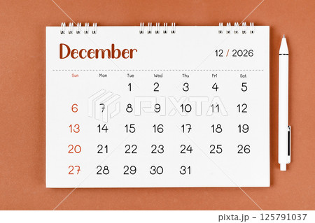 December 2026 Monthly desk calendar for 2026 year and pen. December 2026 Monthly desk calendar for 2026 year and pen. 125791037