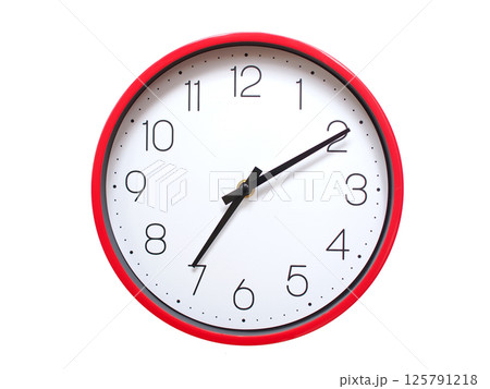 Minimalist red framed wall clock pointing at 07:10 or 19:10. Isolated on white background. Concept of time management. Minimalist red framed wall clock pointing at 07:10 or 19:10. Isolated on white background. Concept of time management. 125791218