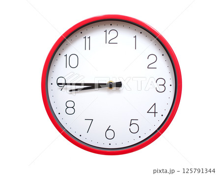 Minimalist red framed wall clock pointing at 08:45 or 20:45. Isolated on white background. Concept of time management. Minimalist red framed wall clock pointing at 08:45 or 20:45. Isolated on white background. Concept of time management. 125791344
