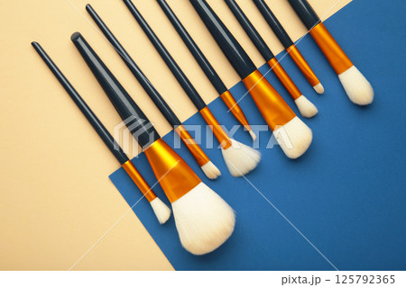 Brush set for make-up on colorful background 125792365