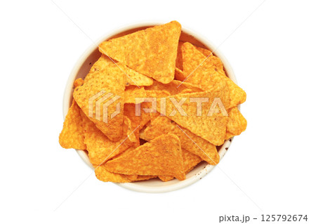 Crispy corn tortilla nachos chips in bowl isolated on white background 125792674
