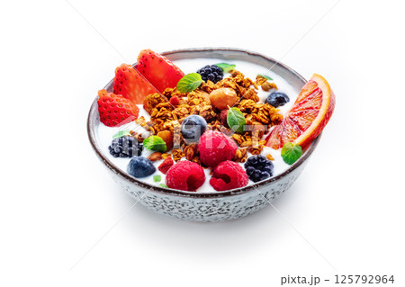 Granola with yogurt and fresh fruit. Organic gourmet muesli with strawberry Granola with yogurt and fresh fruit. Organic gourmet muesli with strawberry 125792964