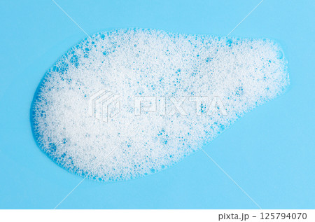 Texture of white foam. Cleansing mousse for the face or bath foam or washing powder. Texture of white foam. Cleansing mousse for the face or bath foam or washing powder. 125794070