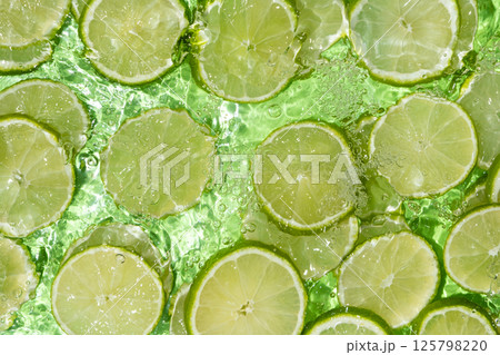 Citrus Lime Splash In Water. Tropical Summer Vibes. 125798220