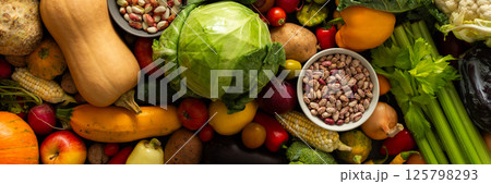 A collection of ripe fresh organic seasonal vegetables from an autumn farm harvest, organic seasonal vegetables A collection of ripe fresh organic seasonal vegetables from an autumn farm harvest, organic seasonal vegetables 125798293