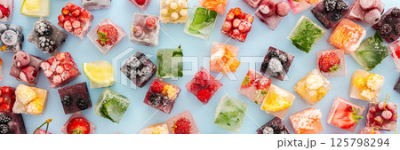 Ice cubes with frozen berries and fruits Ice cubes with frozen berries and fruits 125798294