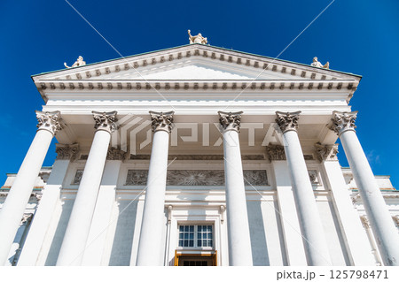 Majestic Helsinki Cathedral rises against the bright sky, showcasing its iconic columns and architecture. 125798471
